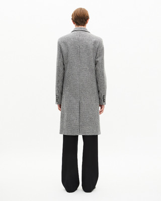 Long black and white wool houndstooth coat