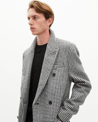 Long black and white wool houndstooth coat