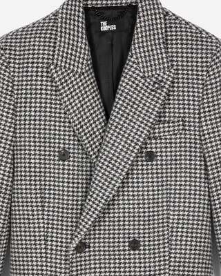Long black and white wool houndstooth coat