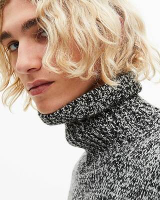 Black and white turtleneck sweater