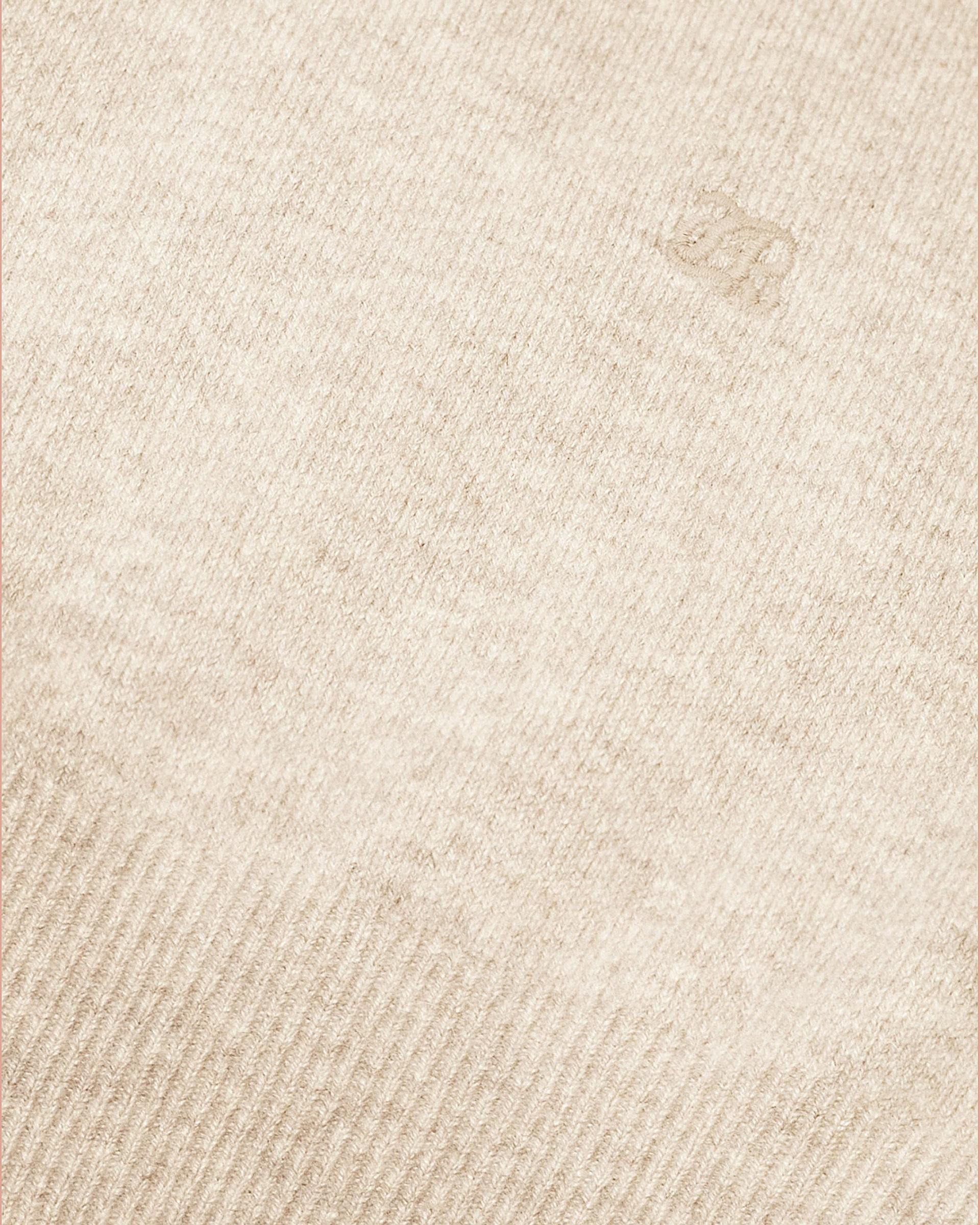Beige cashmere turtleneck sweater