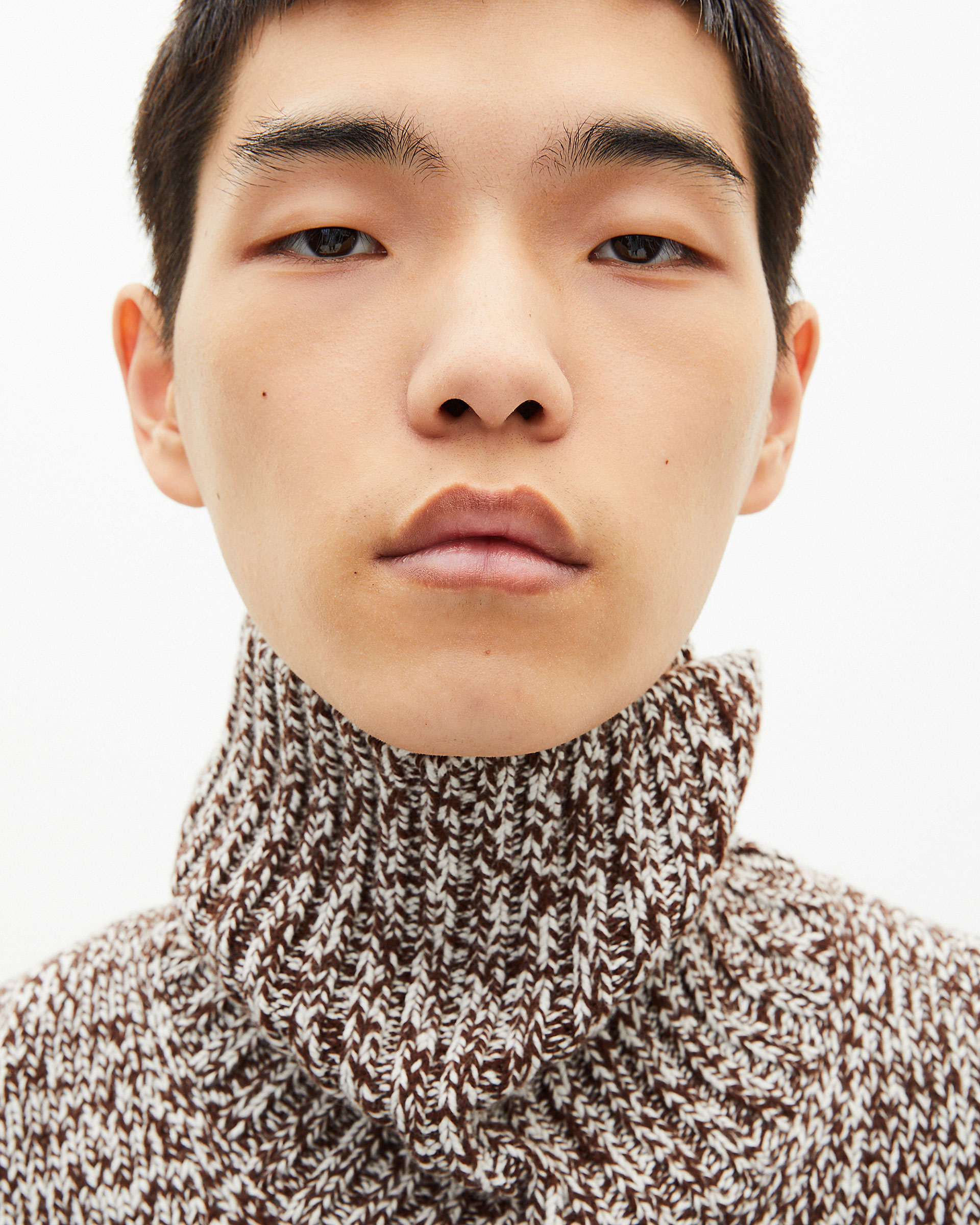 Beige and white turtleneck sweater