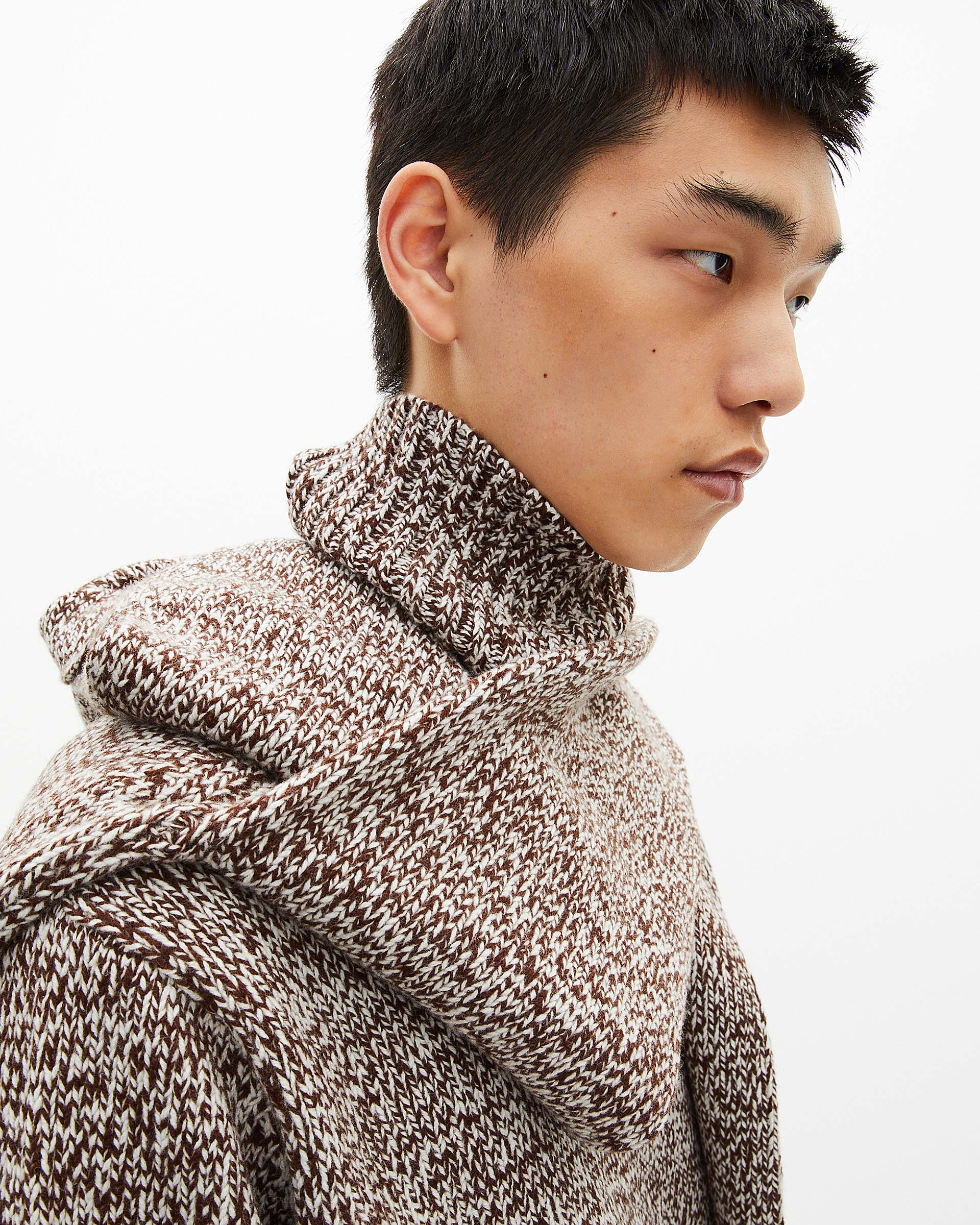 Beige and white turtleneck sweater