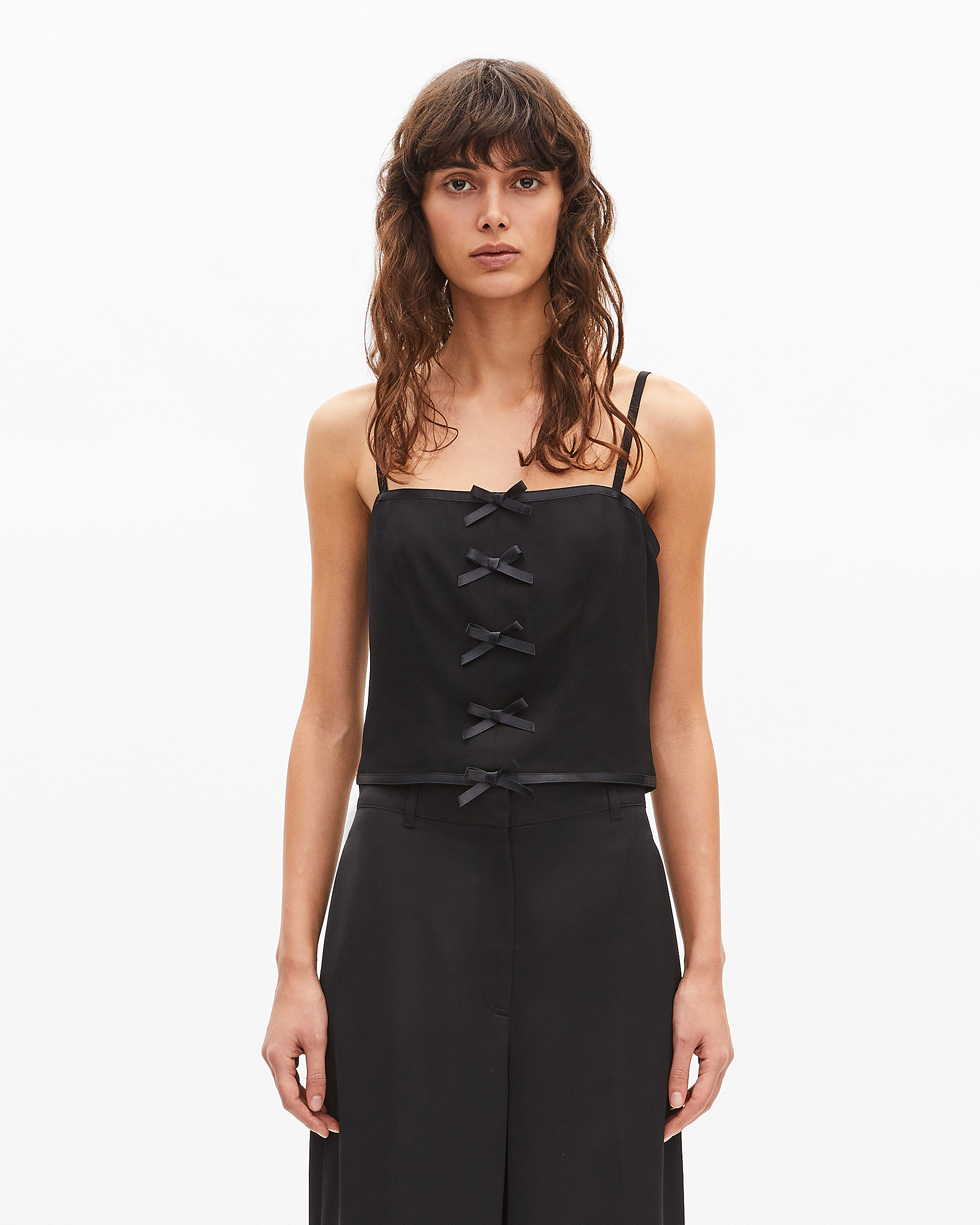 Top with black bow detail