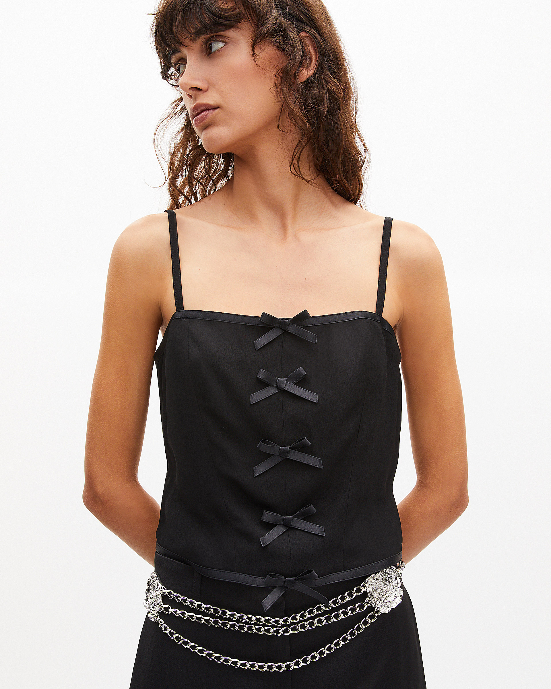 Top with black bow detail