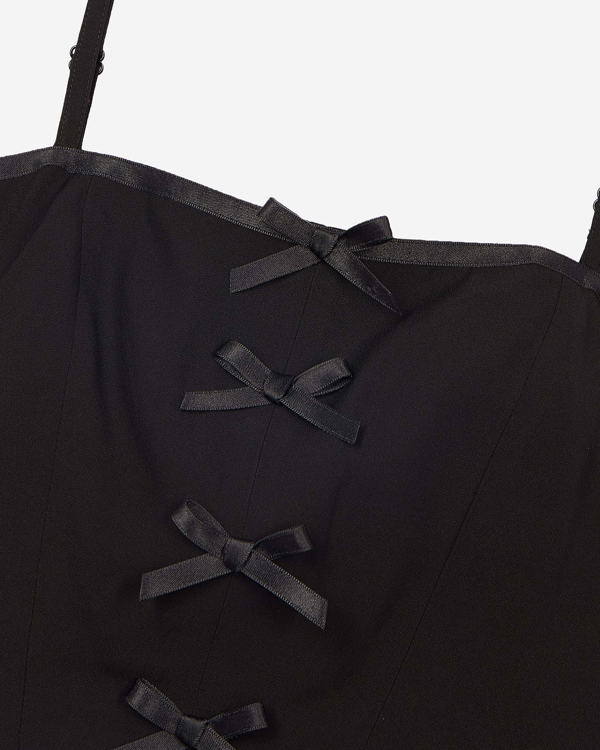 Top with black bow detail