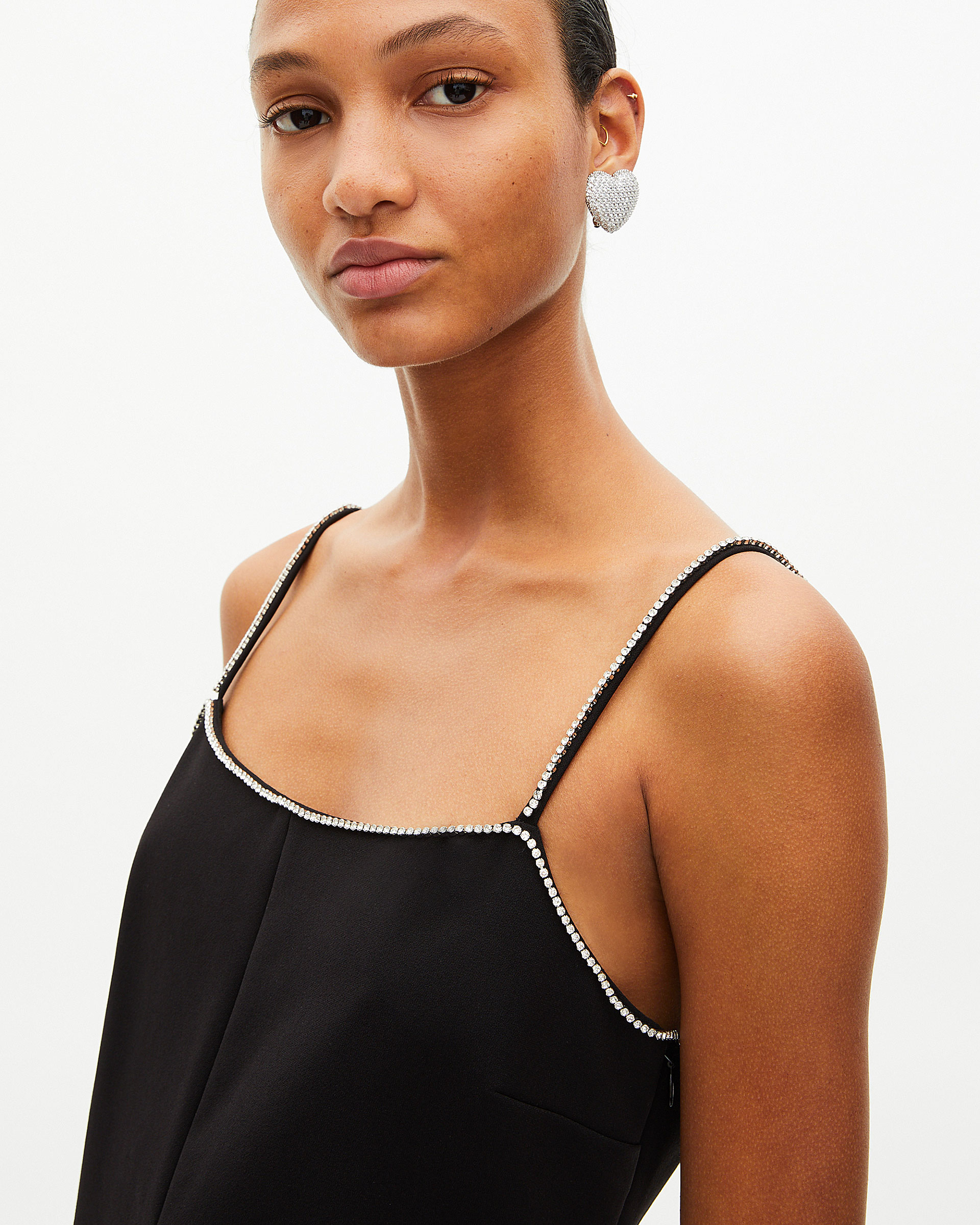 Short dress with black rhinestone details