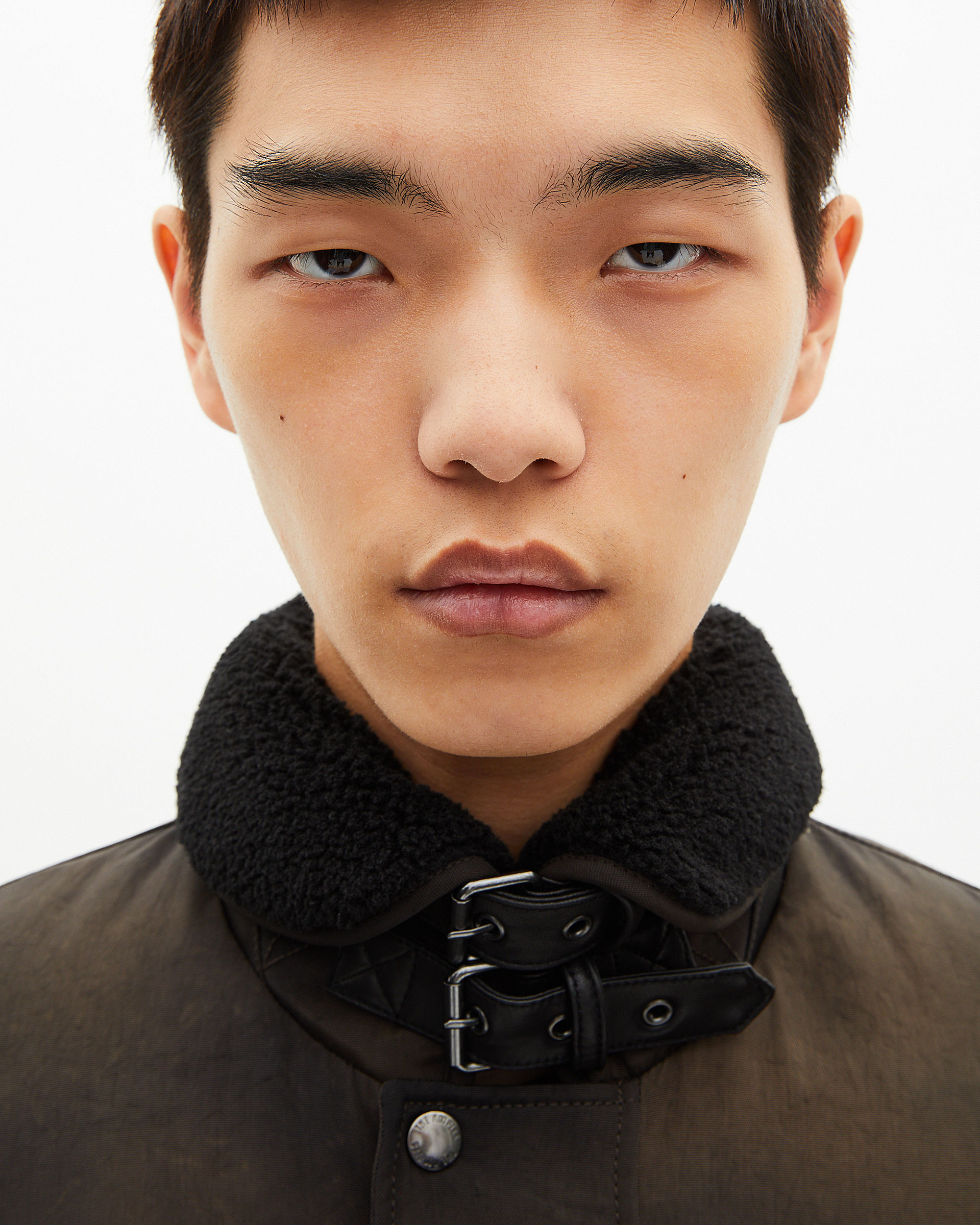 Faded brown sherpa-collared down jacket