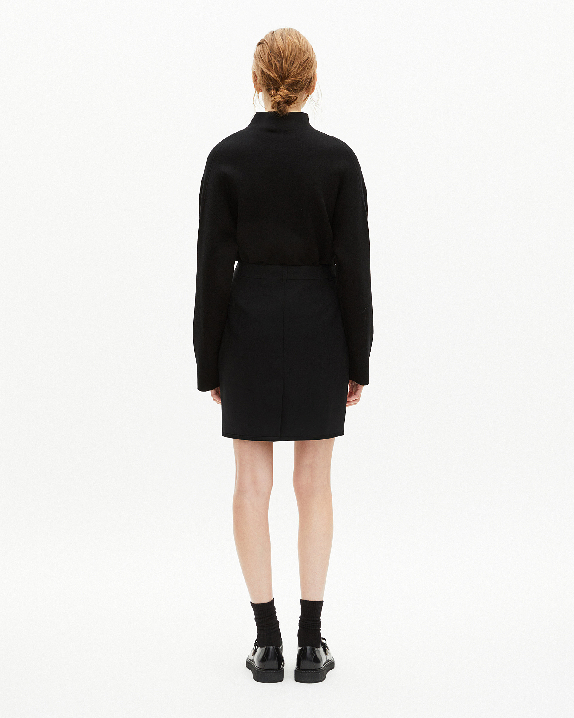 Short skirt with black satin edges