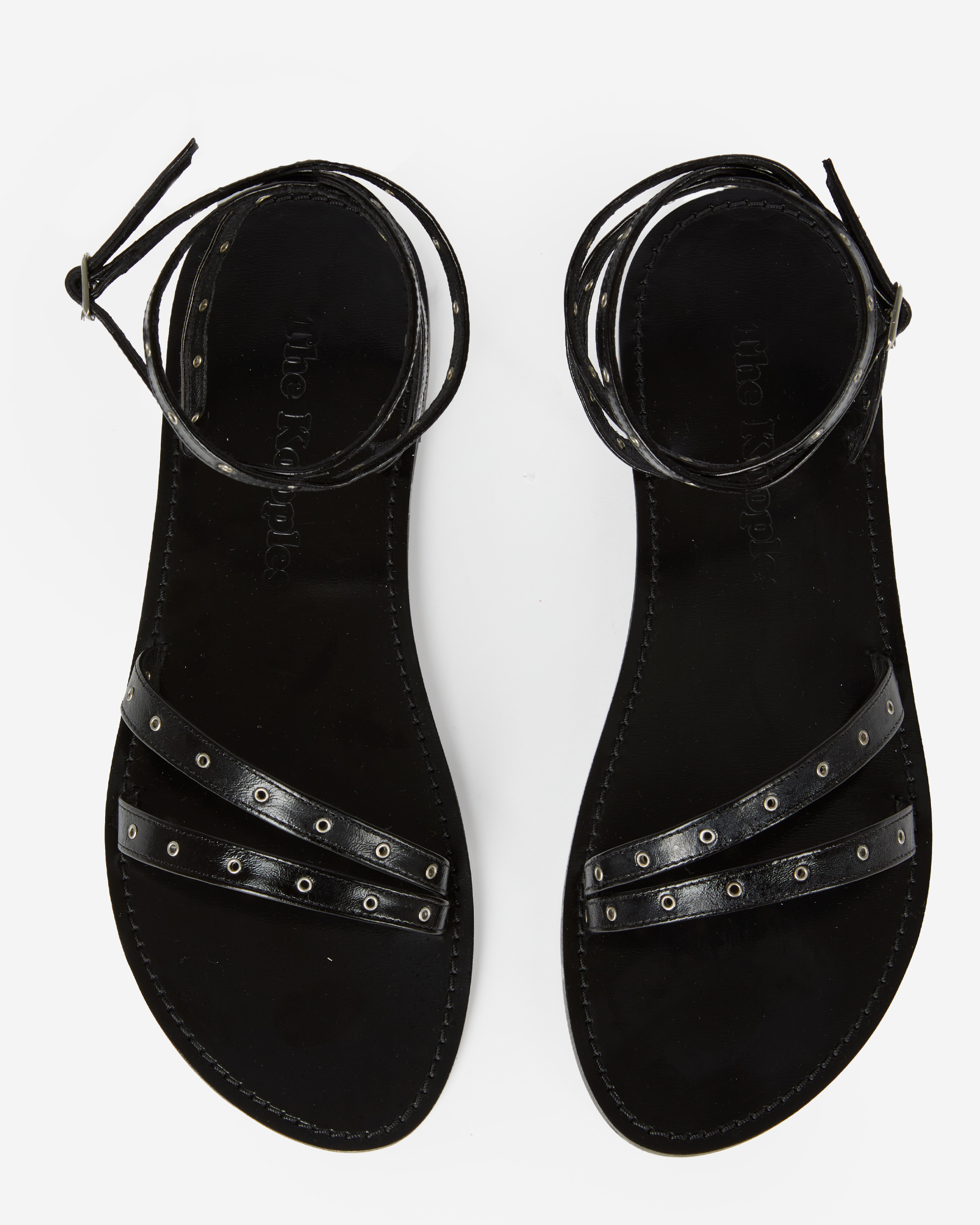 Black leather flat sandals with eyelets