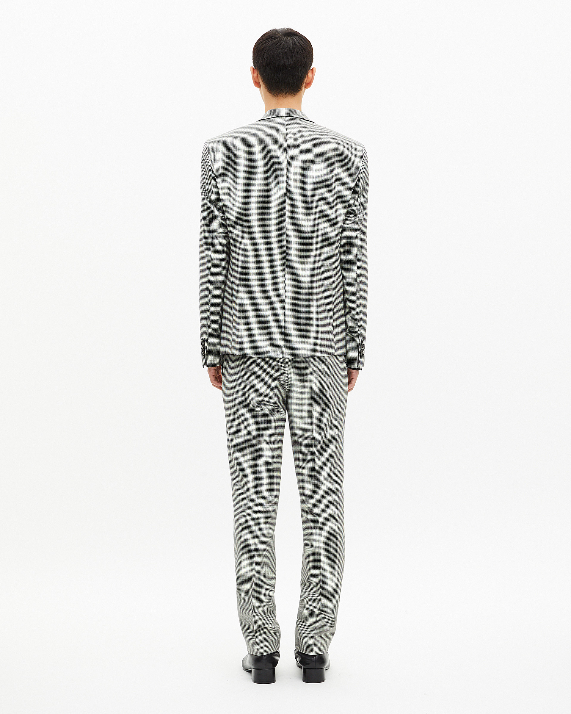 Black and white houndstooth suit jacket