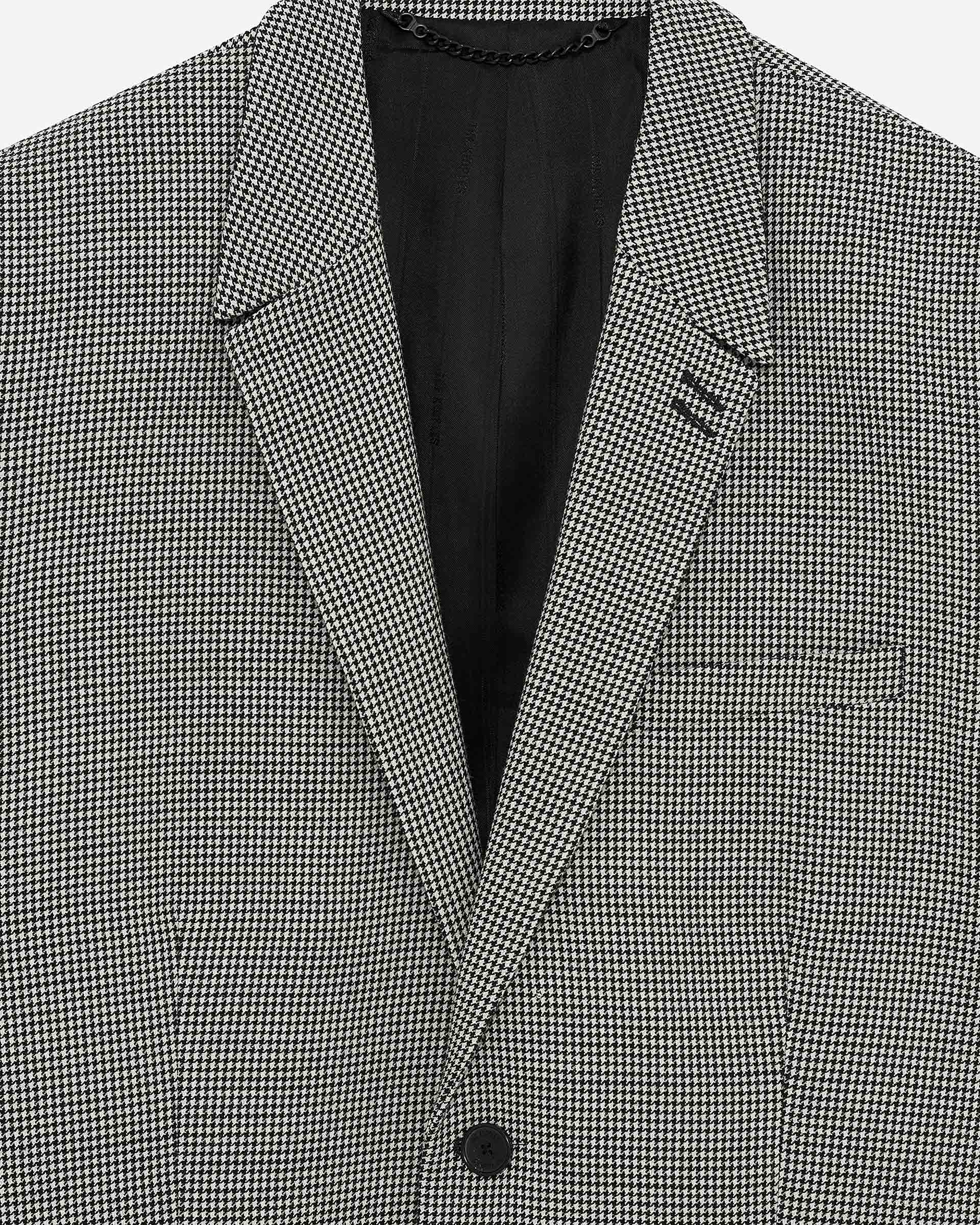 Black and white houndstooth suit jacket