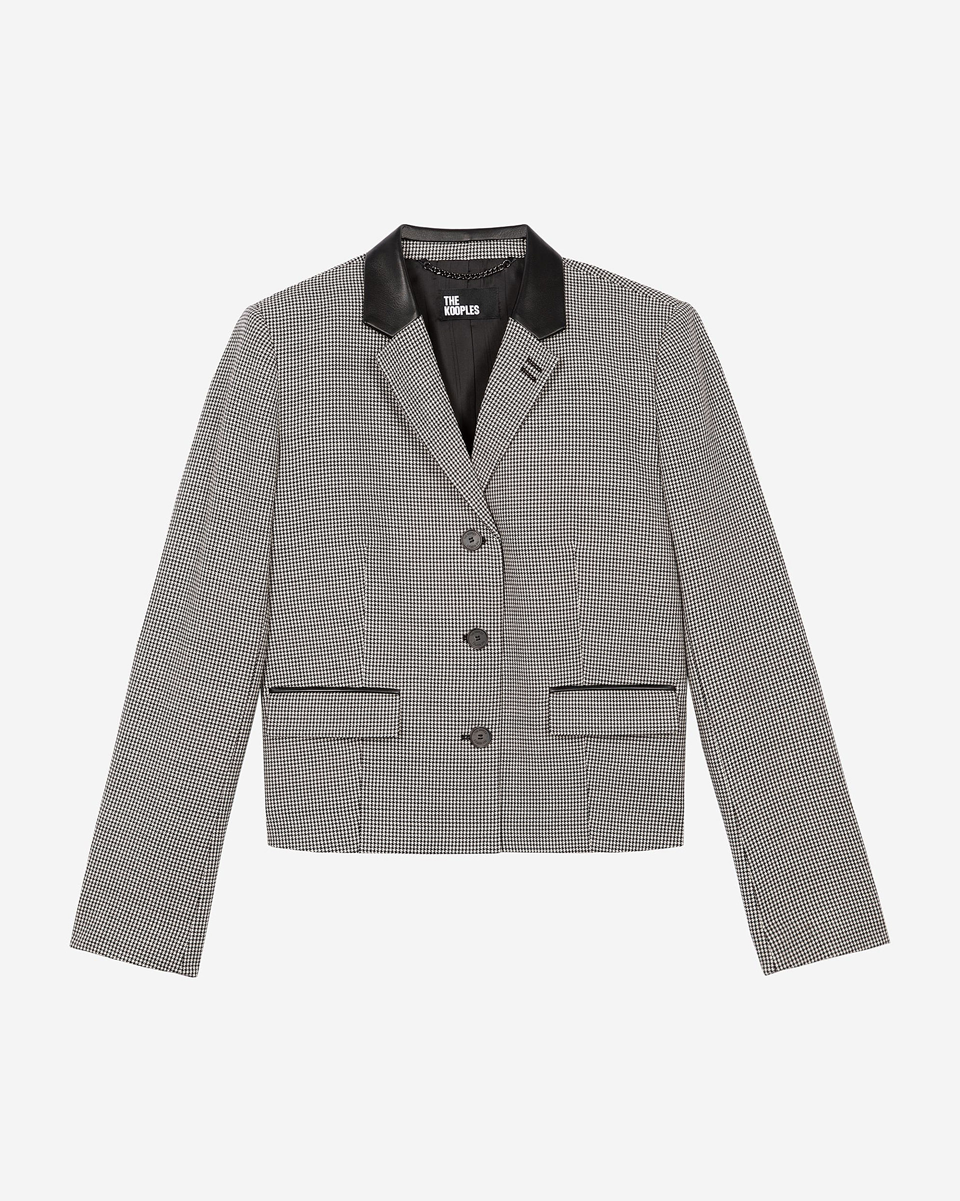 Short black and white houndstooth tailored jacket