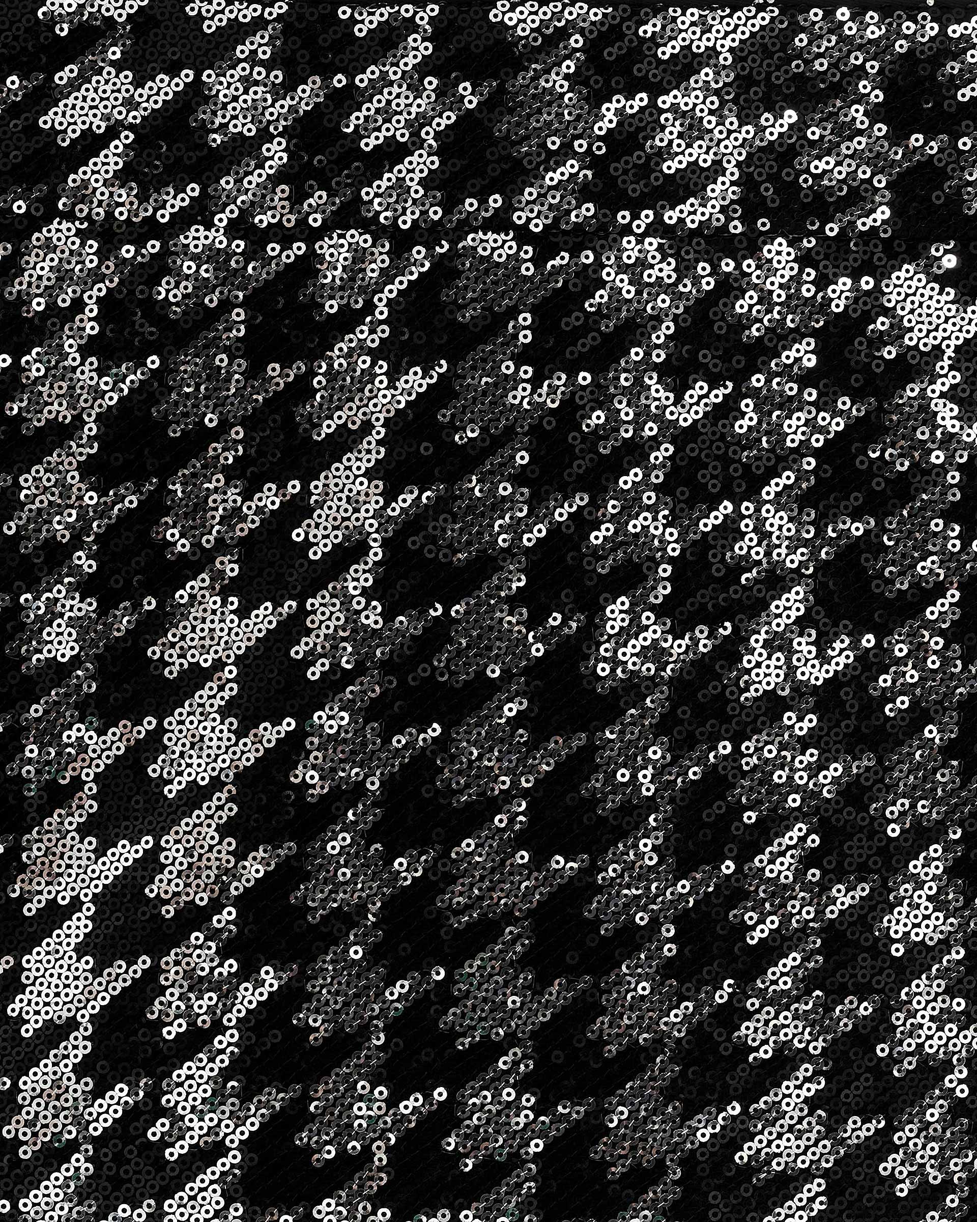 Short houndstooth skirt with black sequins