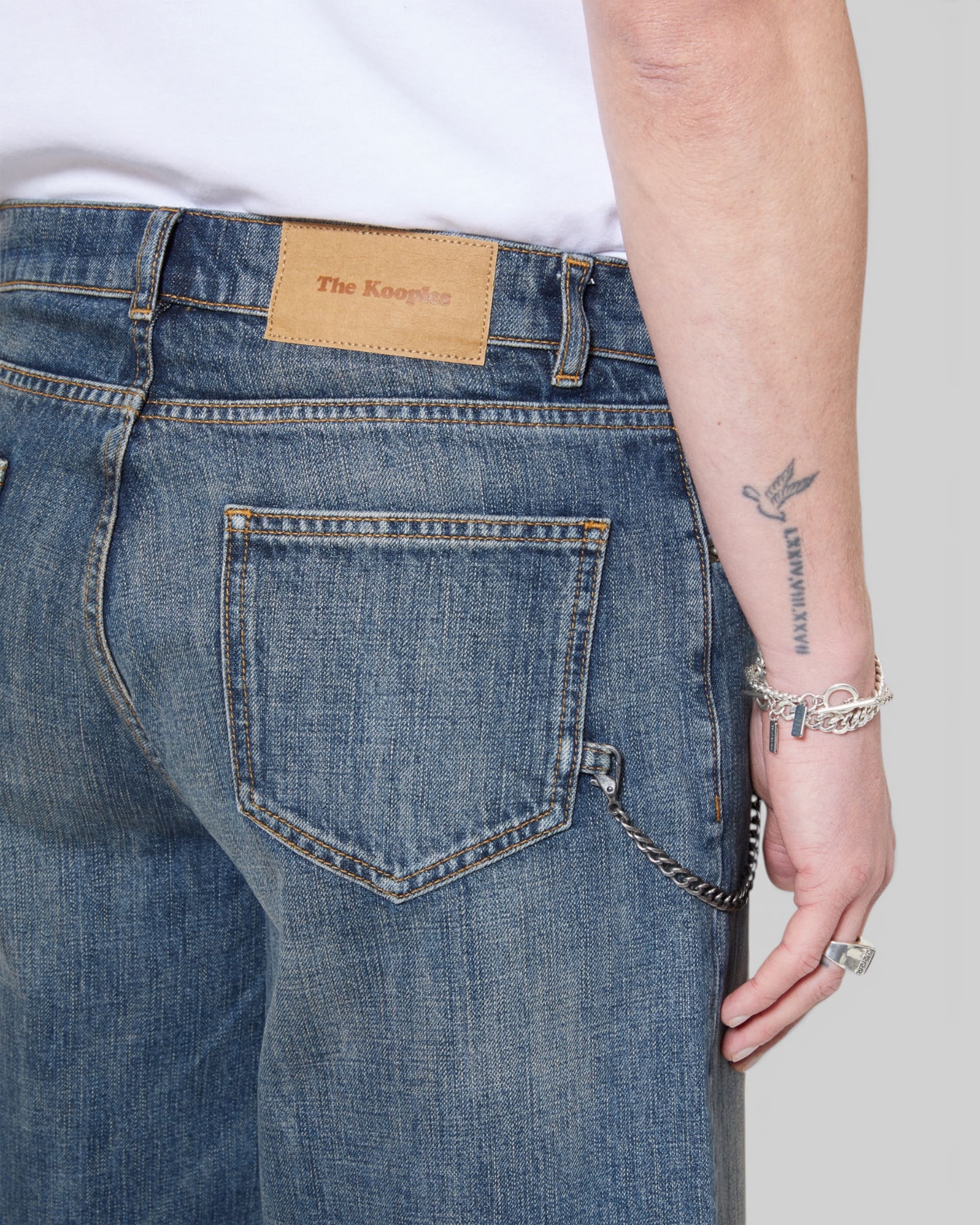 Denim shorts with blue chain