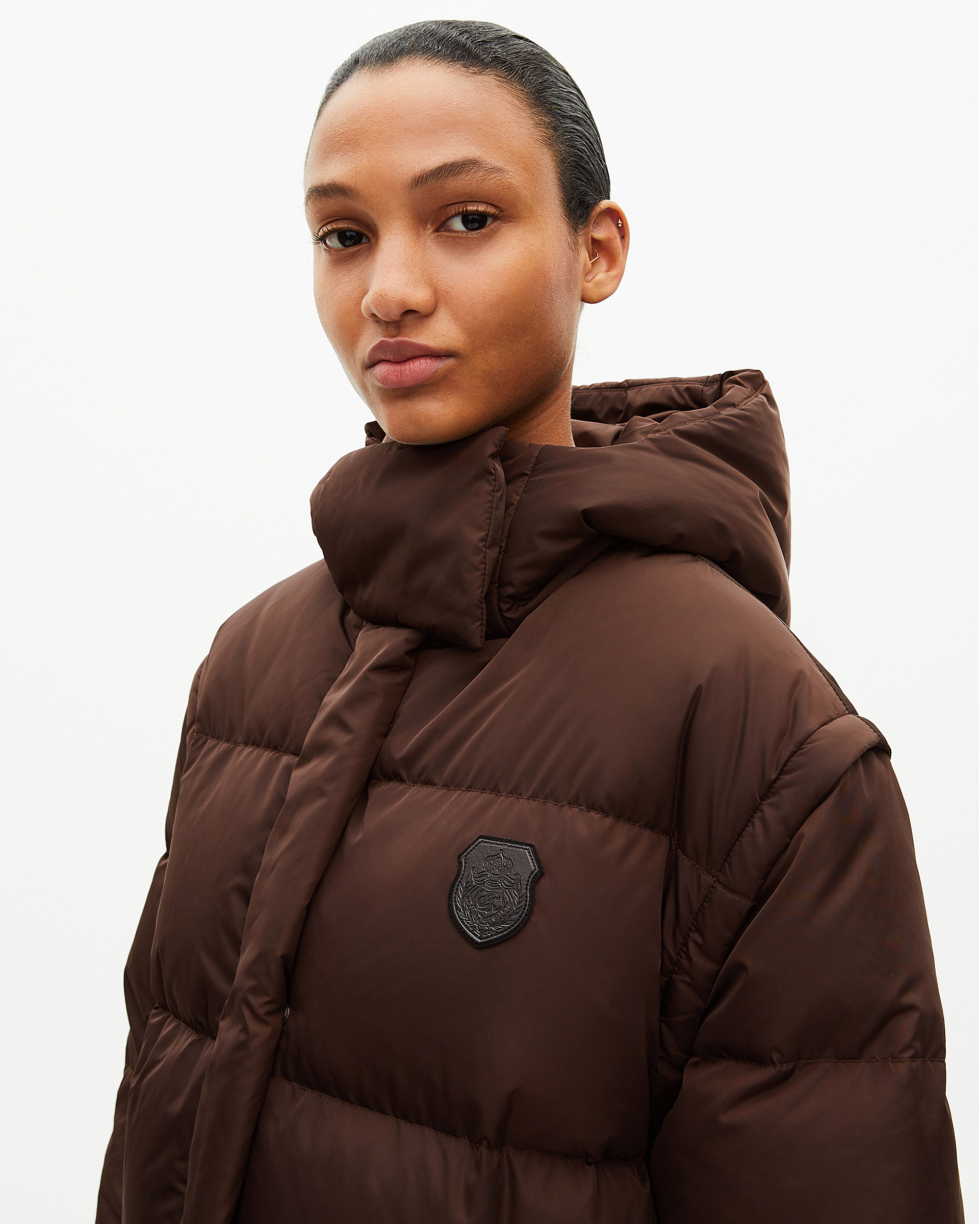 Brown down jacket with removable sleeves