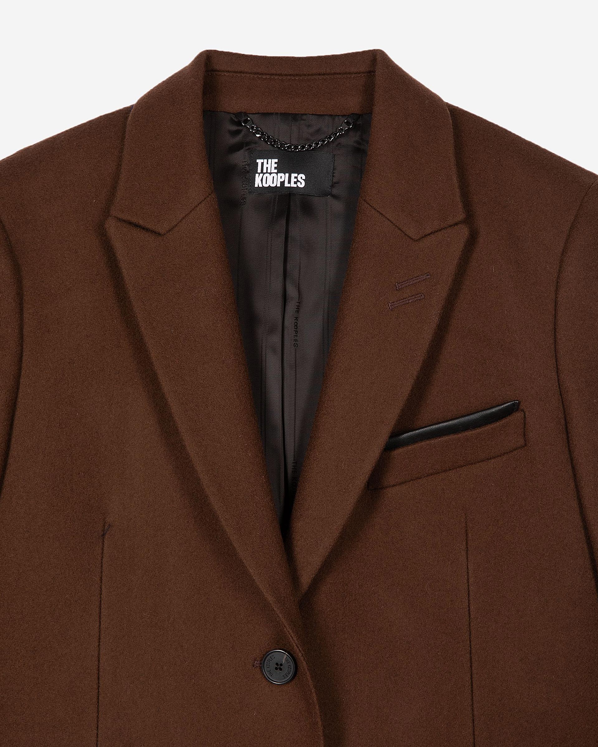 Long wool coat with brown leather details