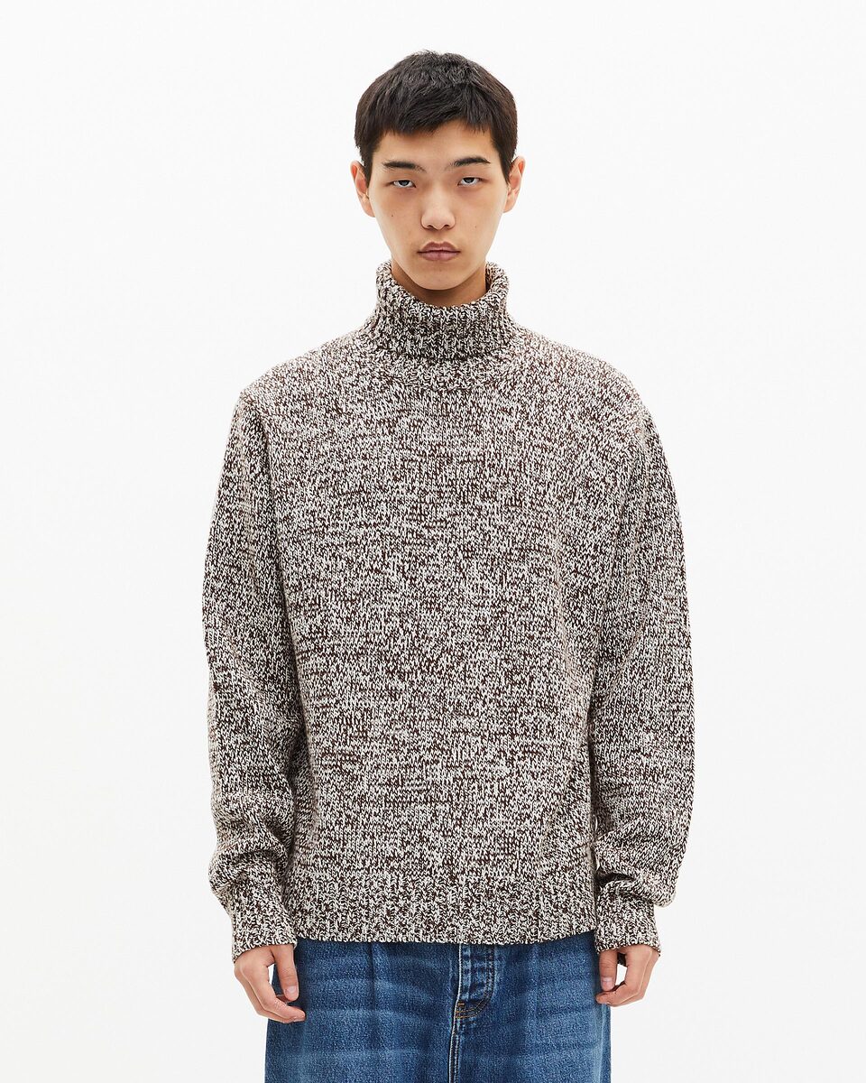 Beige and white turtleneck sweater