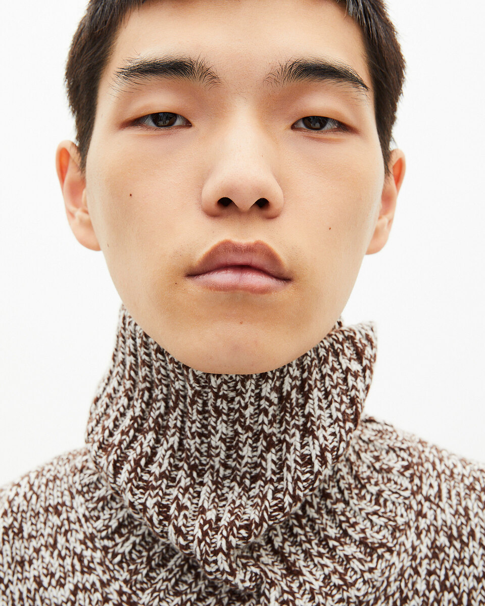Beige and white turtleneck sweater