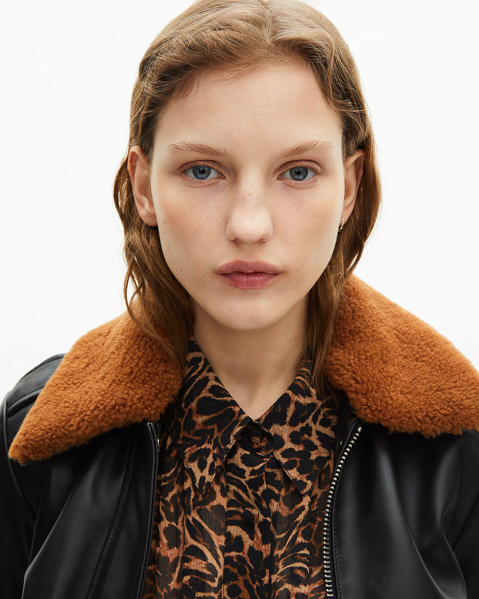 Short black smooth leather jacket with sherpa collar