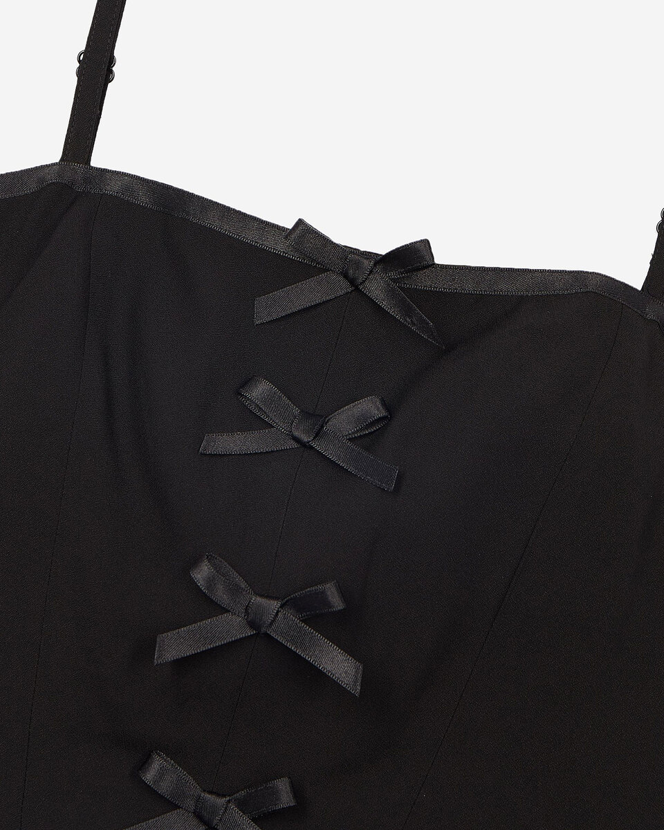 Top with black bow detail