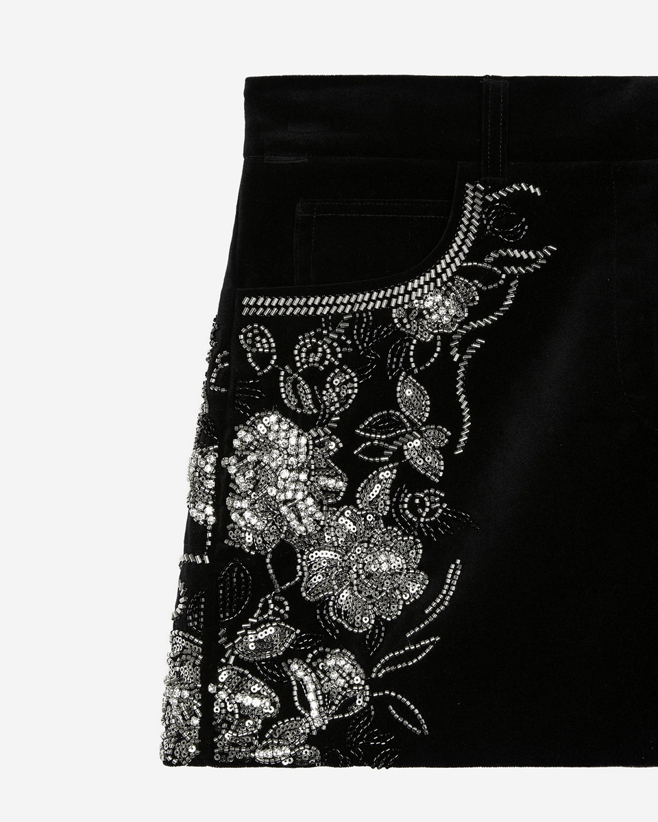 Black velvet shorts embroidered with rhinestones and pearls