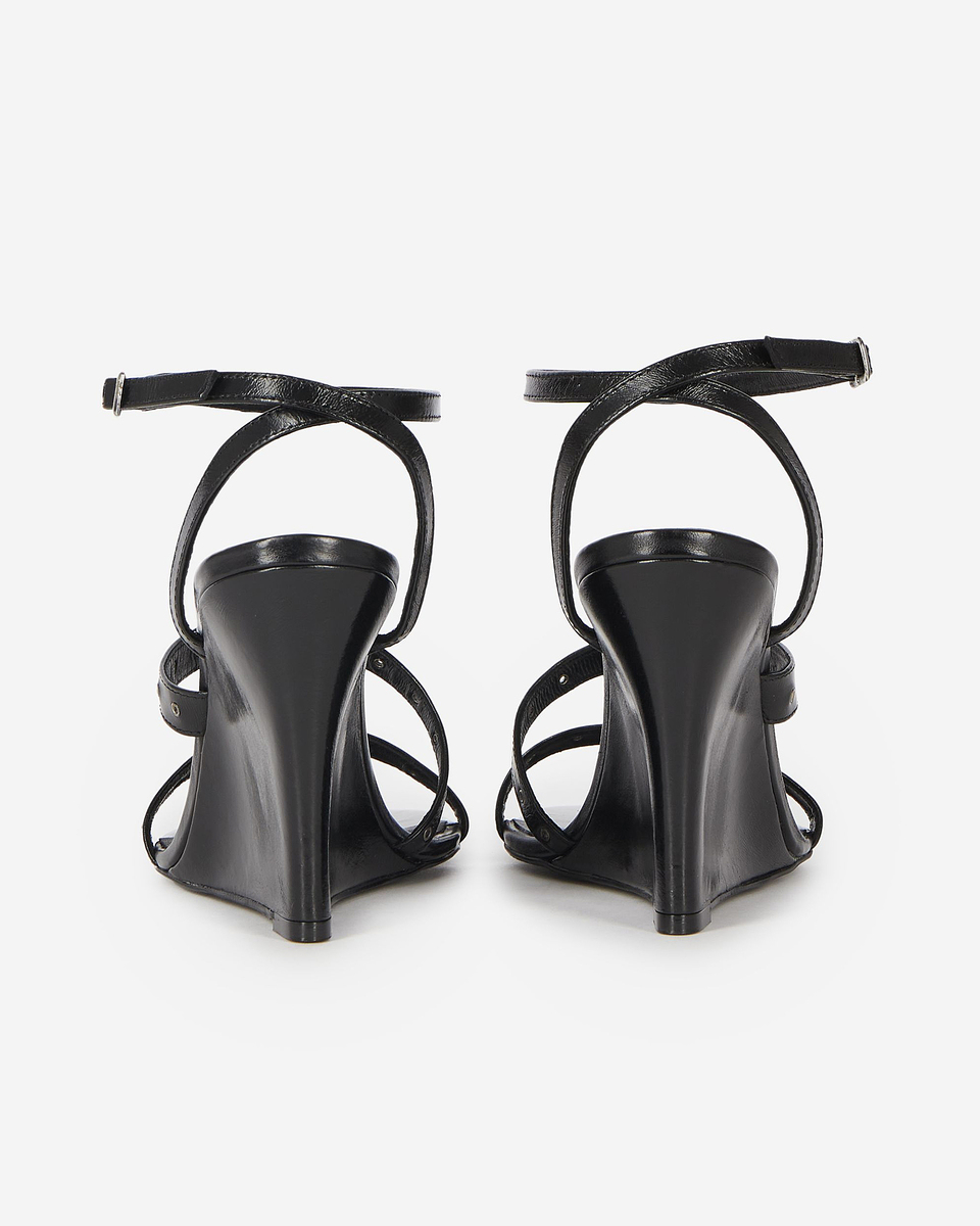 Wedge-heeled sandals with black studs