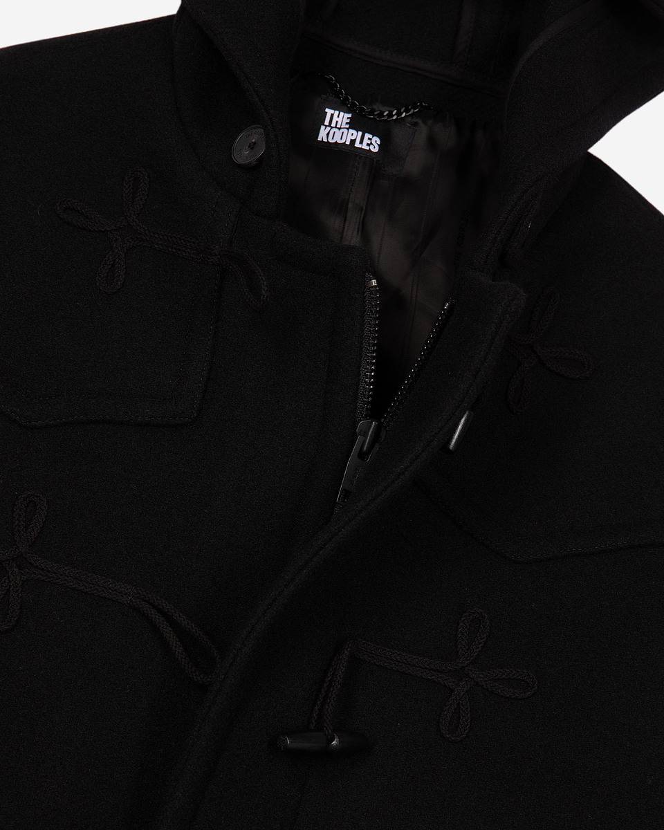 Long black wool coat with Brandenburg closure