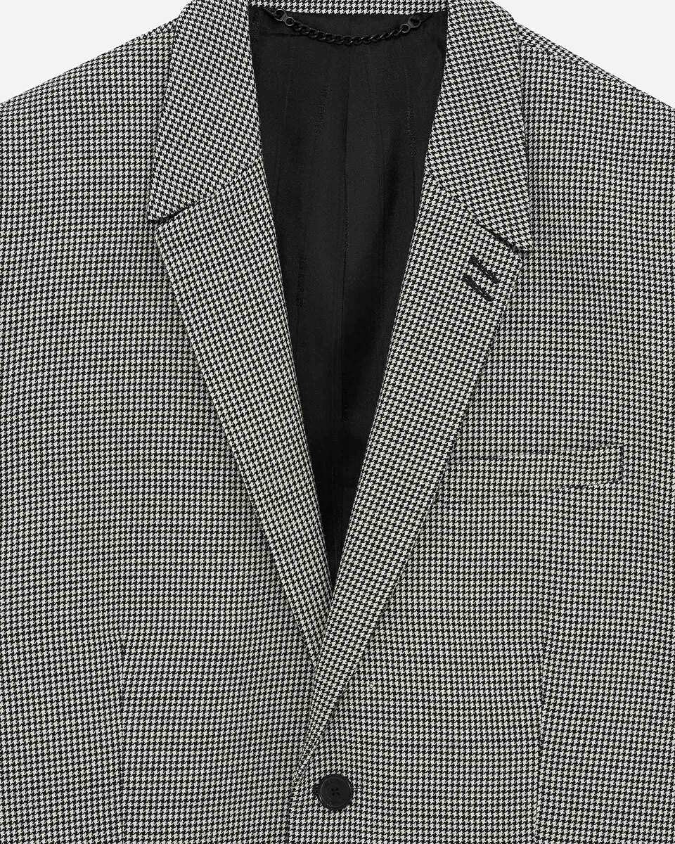 Black and white houndstooth suit jacket