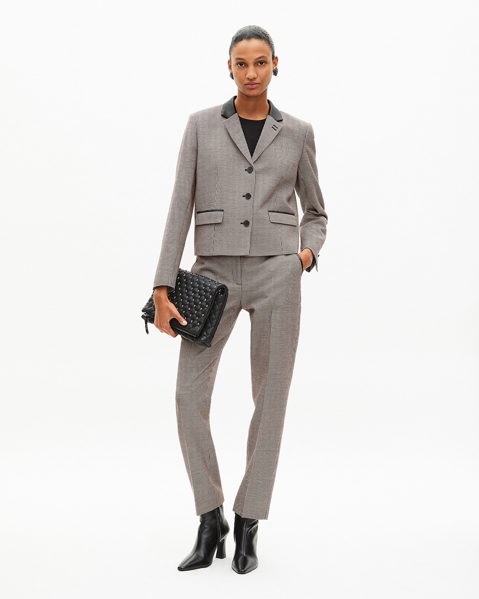 Short black and white houndstooth tailored jacket