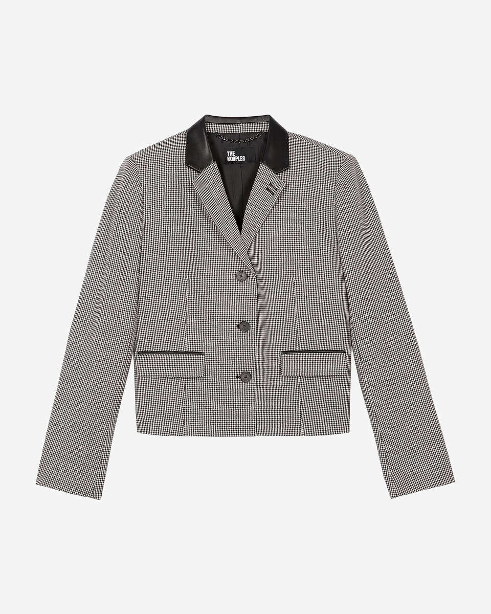 Short black and white houndstooth tailored jacket