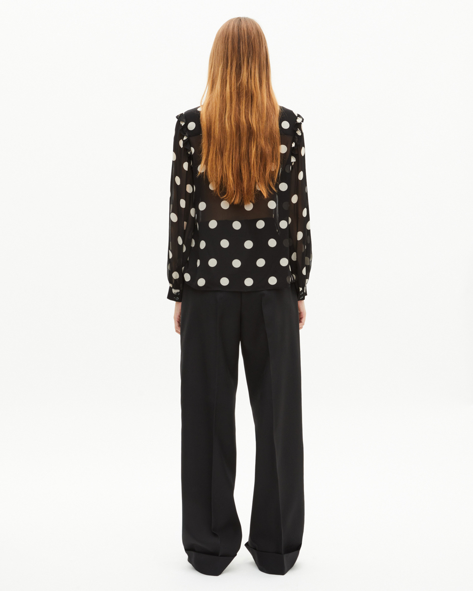 Black polka-dot shirt