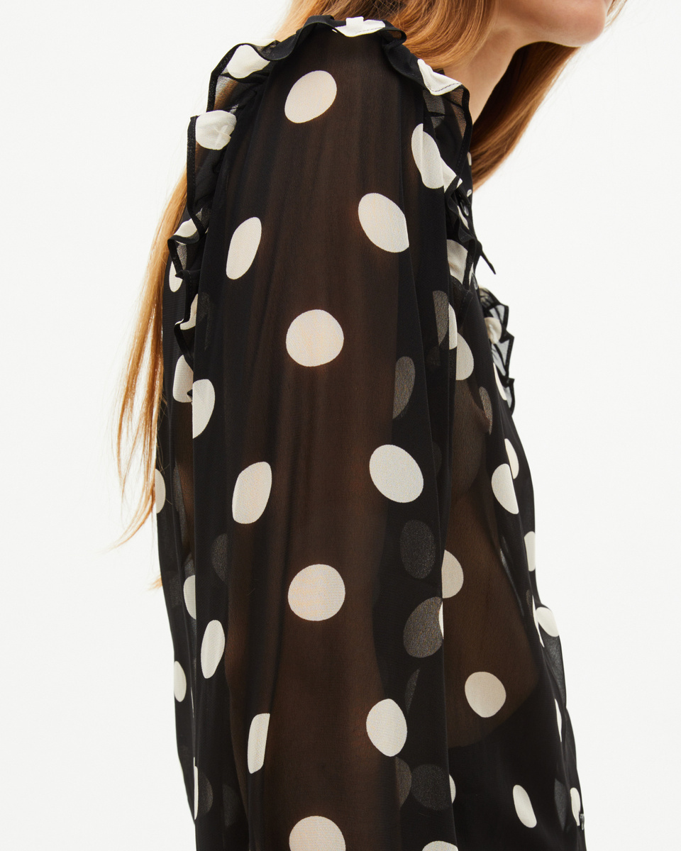 Black polka-dot shirt