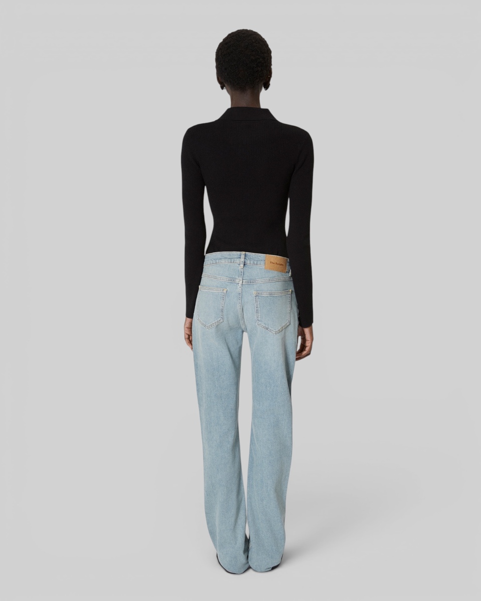 Long slim jeans with blue studs