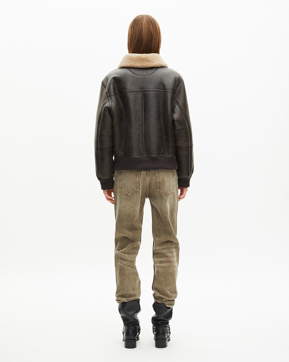 Short brown woolly skin