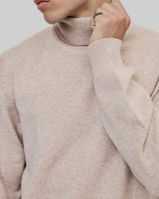 Beige cashmere turtleneck sweater
