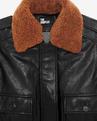 Short black smooth leather jacket with sherpa collar