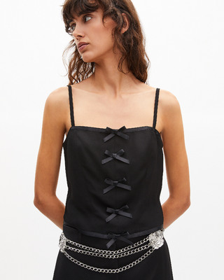 Top with black bow detail