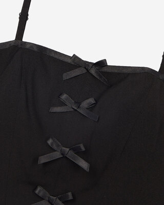 Top with black bow detail