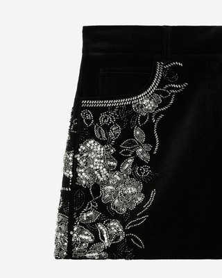 Black velvet shorts embroidered with rhinestones and pearls