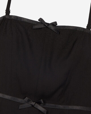 Short dress with black bow detail