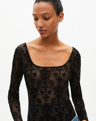 Mesh bodysuit with black flocking
