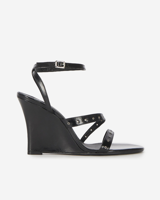 Wedge-heeled sandals with black studs