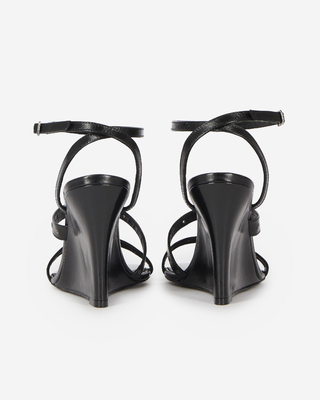 Wedge-heeled sandals with black studs