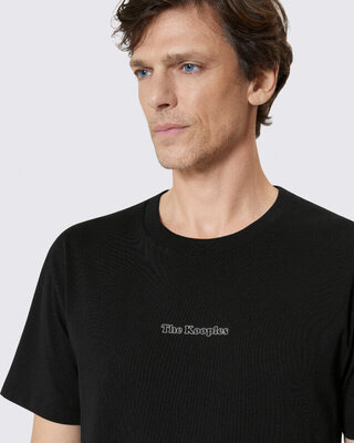 T-shirt with black cut-out logo