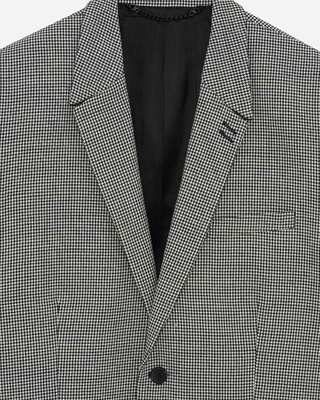 Black and white houndstooth suit jacket