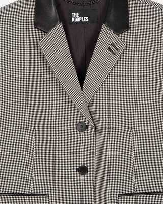 Short black and white houndstooth tailored jacket