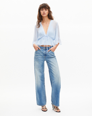 Blue ruffled blouse