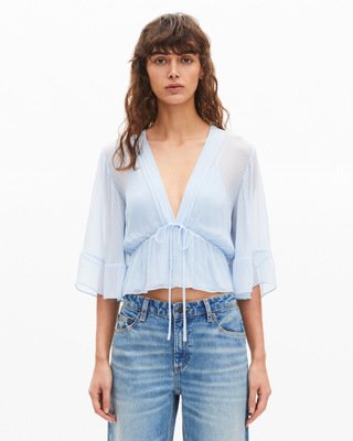 Blue ruffled blouse