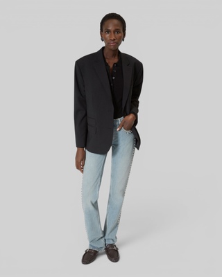 Long slim jeans with blue studs
